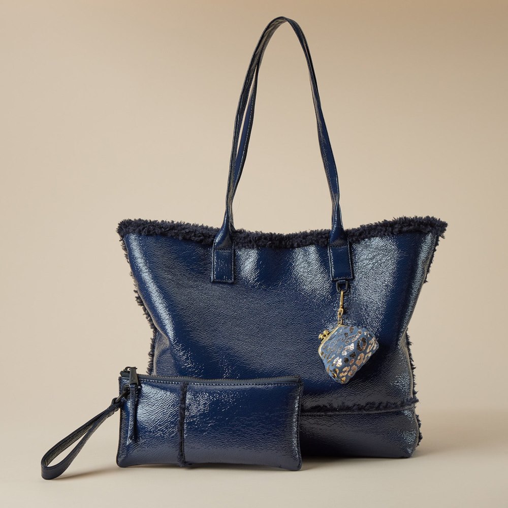 Hobo | Vida Wristlet in Pebbled Patent With Faux Shearling - Deep Indigo