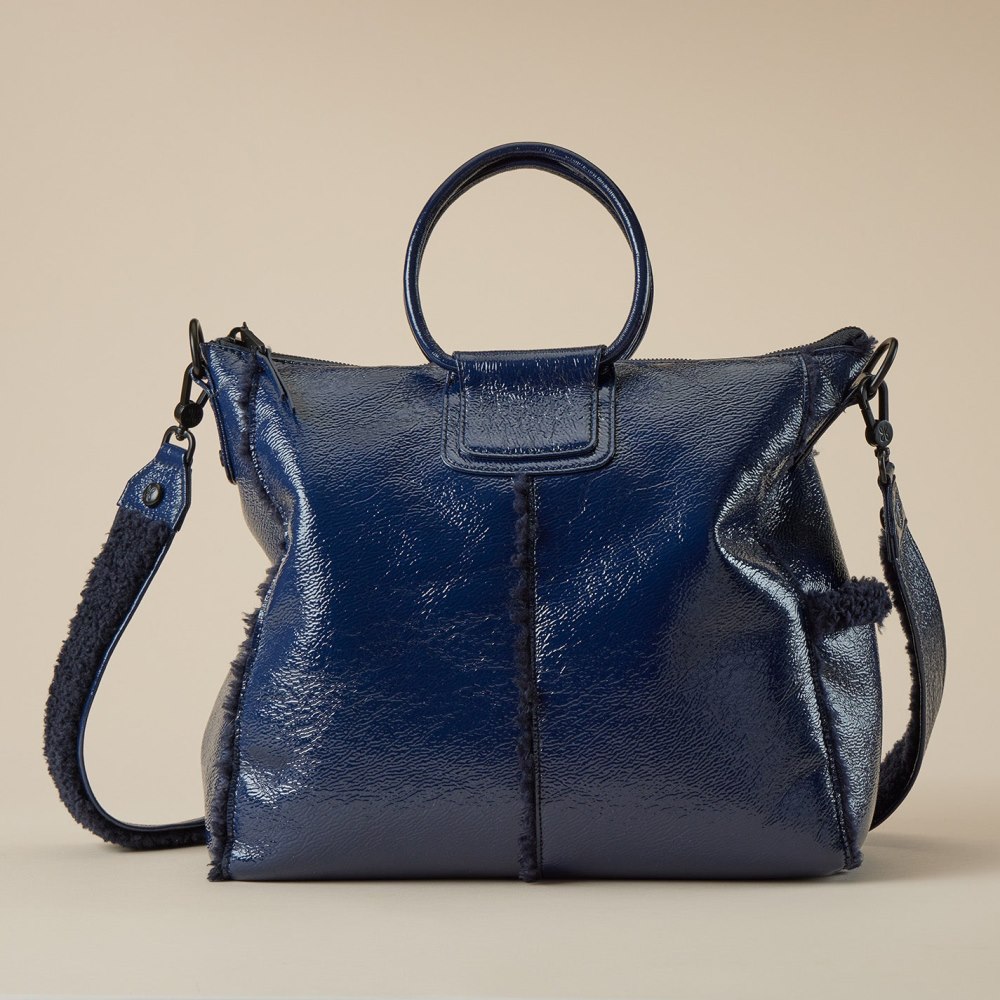 Hobo | Sheila Large Satchel in Pebbled Patent With Faux Shearling - Deep Indigo