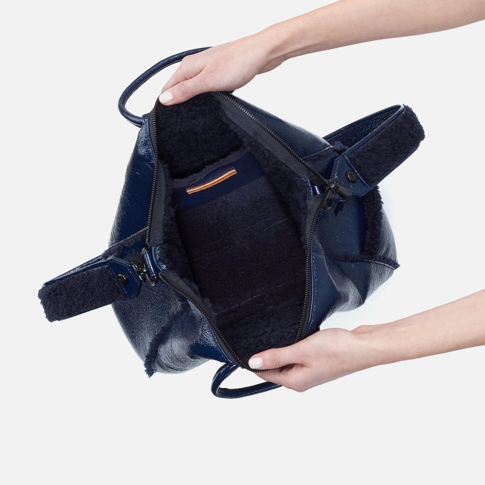 Hobo | Sheila Large Satchel in Pebbled Patent With Faux Shearling - Deep Indigo