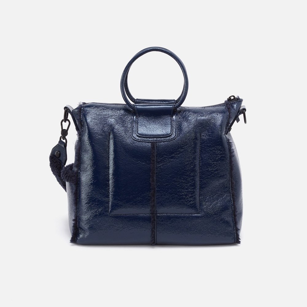 Hobo | Sheila Large Satchel in Pebbled Patent With Faux Shearling - Deep Indigo